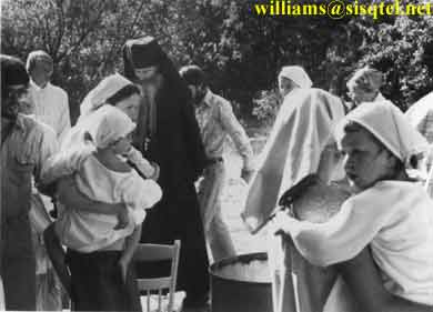 During the baptismal procession at the old Saints Adrian and Natalie church in Etna, 1981 - Copyright � The Blessed Seraphim Hermitage